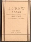 logo of J. Crew socks, one pair cashmere blend text with tan background