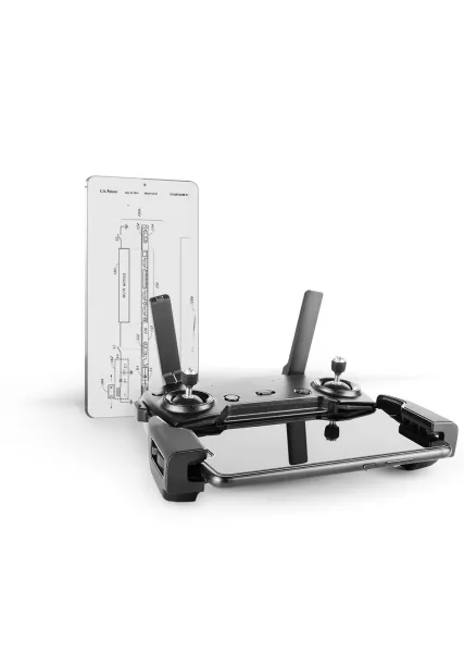 A remote control sits in front of a patent illustration. 